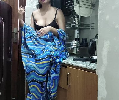 Indian stepmom watches and enters her stepson’s Kitchen to fuck him